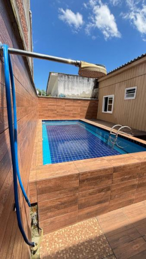 Casa com piscina próximo a Meia Praia, Itapema-SC